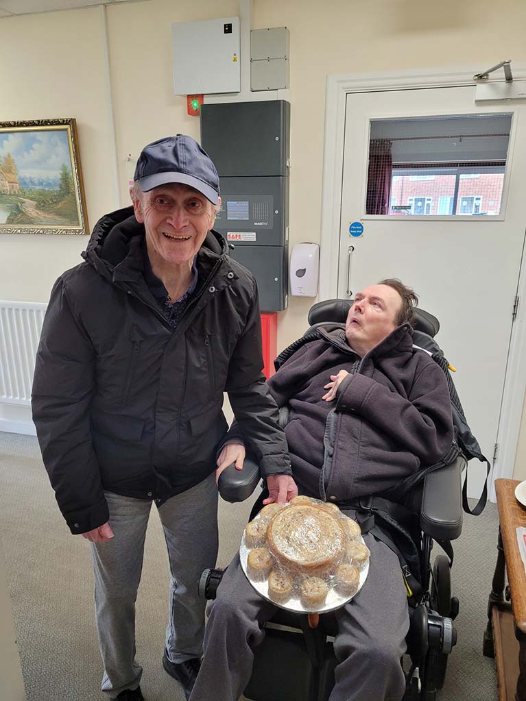 Balmaclellan, Walter and Darren helped to bake some cakes and then delivered them to a local
                        retirement home in the village.
