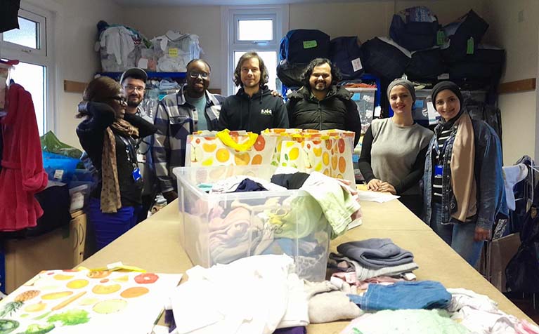Isaac and the team volunteered at Their Voice. The team went to the clothing
                            packing lodge in Caterham and spent their time packing clothes packages for children and
                            adults.