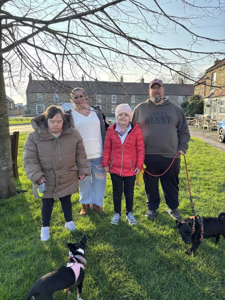 Heather and Gillian spent time helping people around the village by oﬀering to walk their dogs.