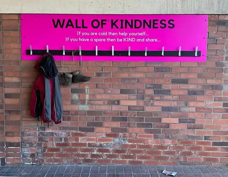 Karen and Chantelle Marketing collected warm coats, hats, gloves and scarves to donate
                            to the Wall of Kindness in Middlesbrough.