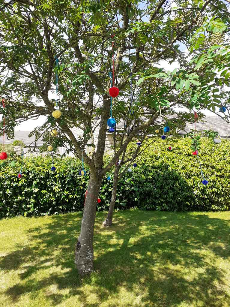 We have decided to decorate the garden area and have a colourful pom pom tree to lift everyone’s spirits